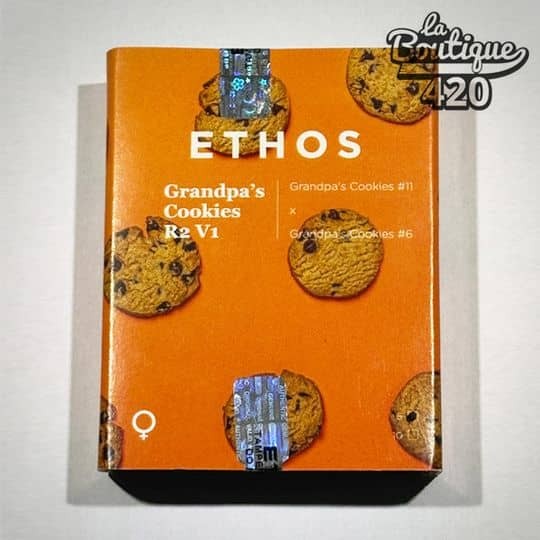 Orangefarbene Verpackung der feminisierten Grandpa's Cookies R2V1-Samen von Ethos Genetics mit Cookie-Abbildungen